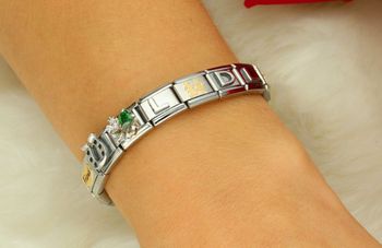 Srebrna zawieszka Nomination Link w kształcie koniczyny z zieloną cyrkonią model 33032210. Oryginalna biżuteria Nomination Italy – symbol szczęścia i elegancji (1).jpg